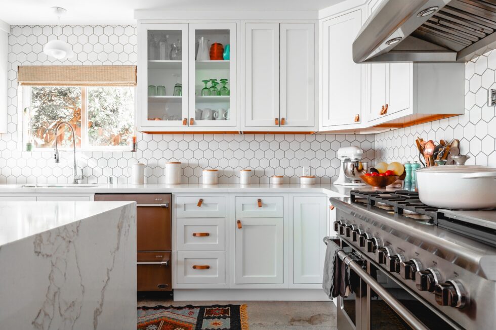 Kitchen with white cabinets and countertop