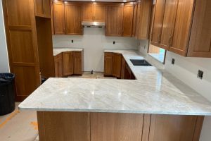 Quartz countertop with wooden cabinets